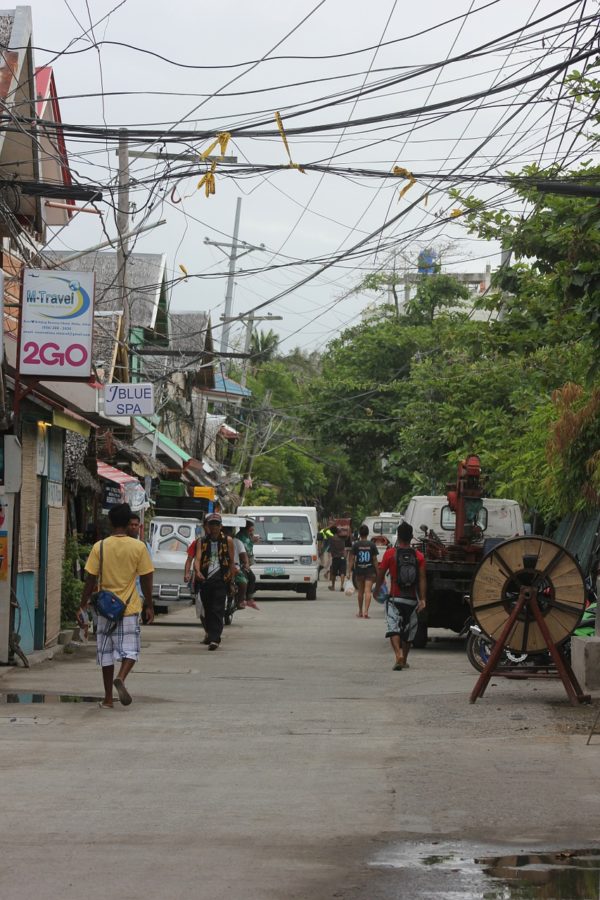 people walking along the streets of Boracay